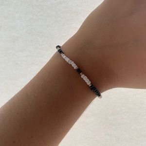 Homemade black, white and gold bracelet